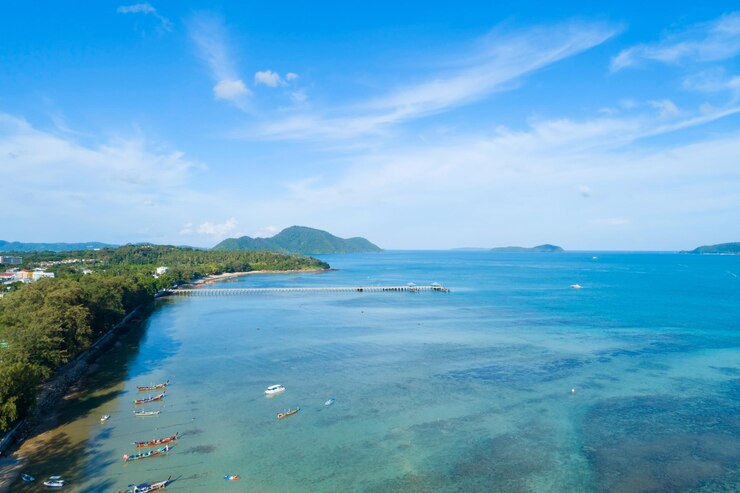 aerial-view-drone-shot-tropical-sea-rawai-beach-phuket-thailand-beautiful-scenery-andaman-sea-small-island-summer-season-beautiful-travel-background-website-design-nature-view_34362-2767.jpg