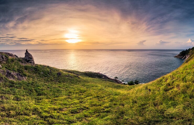 sunset-horizon-ocean-with-green-hill-laem-krating-phuket_49071-4827.jpg
