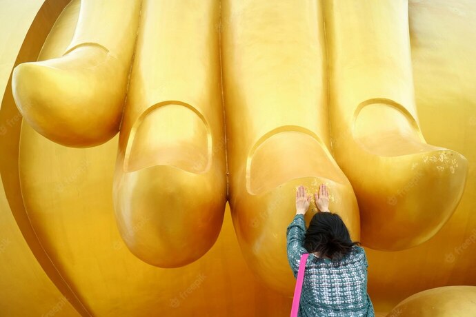 woman-touching-finger-great-buddha-image-blessing-wat-muang-temple-thailand_76000-9434.jpg